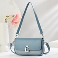 Blue crossbody bag for women with woven texture, leather flap, and silver hardware lock - Soft Blue
