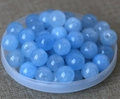 Macro detail of sky blue round glass beads with holes for DIY jewelry making - 8mm / Light Blue