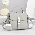 Light gray litchi texture trapezoid handbag with silver twist lock and mini lock charm - Gray