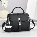 Minimalist black faux leather handbag with contrast stitching and adjustable shoulder strap - Black