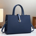 Borsa a mano blu scuro a righe alla moda con chiusura dorata e tracolla rimovibile - Blu
