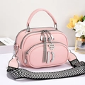 Pink lychee texture shoulder bag with three zippers and wide geometric strap - Pink