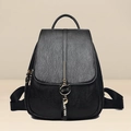 Women's black PU leather backpack featuring a gold cat pendant and trendy ribbon detail - Cat Pendant Style / Black