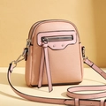 Pink lychee leather crossbody phone bag with silver zippers and classic rivet details - Pink