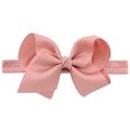 Elastic baby headband with a large dusty pink grosgrain ribbon bow on white background - Lotus root pink