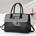Elegant black crocodile pattern handbag with dual handles and gold metal buckle - Black