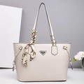 Detail of creamy white tote bag featuring lychee grain texture and silk scarf decoration - Off-white