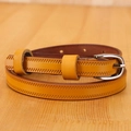Detail of ginger leather belt with zigzag stitching and silver buckle on wood surface - 105cm / Camel