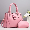 Pink striped handbag set with matching pouch featuring gold buckle and detachable shoulder strap - Pink