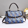 Chic women's crossbody bag with blue geometric pattern and dark brown leather trim - Blue