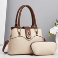 Detail of beige woven tote bag set with brown leather trim and golden teardrop twist lock - Off-white
