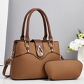 Detailed view of brown woven texture handbag set with gold teardrop lock and pouch - Khaki/Earth Yellow