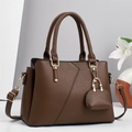 Elegant brown pebbled leather handbag with trapezoid shape and matching mini charm pouch - Coffee