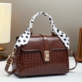 Brown crocodile embossed handbag with glossy finish and decorative silk scarf wrap handle - Coffee