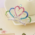 Close-up of colorful rhinestones on a heart-shaped silver hair comb for girls - Multicolor Style 5