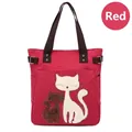 Red canvas tote bag with embroidered cat patterns and adjustable dark brown straps - Red