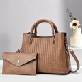 Detail of brown faux leather handbag with geometric embossed pattern and silver hardware - Dark Khaki