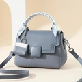 Chic blue crossbody bag with woven texture, silk scarf handle, and mini envelope charm - 21cm x 10cm x 15cm / Blue