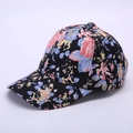 Black floral baseball cap for women with colorful small flower patterns and curved brim - Black