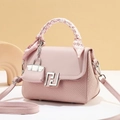 Pink leather handbag with woven texture and decorative scarf on handle for women - Pink