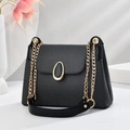 Fashionable macaron shoulder bag with woven texture and gold chain strap for women - Black