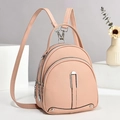 Pink faux leather mini backpack with three zipper compartments and silver hardware - Pink