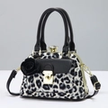 Detail of leopard print handbag with rose charm and rhinestone clasp closure - Black Leopard