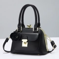 Classic black leather handbag with gold lock and elegant 3D rose charm attachment - Black