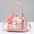 Elegant pink crossbody bag with gold frame, diamond knob and rose charm accessory - Pink