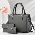 Detailed set of three grey embossed handbags with elegant gold hardware and textured finish - Gray