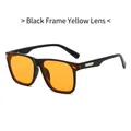 Square black frame sunglasses with vibrant yellow lenses and metal temple detail - Black Frame Orange Lens