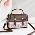 Brown leather and pink print crossbody handbag with top handle on white background - 21cm*9cm*15cm / Purple