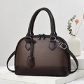 Detailed view of dark brown pebbled leather texture and silver zipper of the Boston bag - 23.5x10.5x17cm / Coffee
