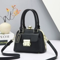 Elegant black toothpick pattern handbag with gold hardware and a jewel clasp for women - Black