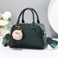 Dark green lychee leather handbag with golden hardware and white cat plush charm - Dark Green