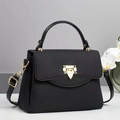 Elegante borsa nera a trapezio con chiusura dorata, tessuto testurizzato e tracolla - Nero
