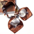 Elegant satin square scarf with leopard print and chain pattern tied in a bow - 5010 Orange Chain Leopard
