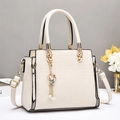 Elegant off-white crocodile embossed handbag with gold hardware and pearl rabbit charm - Off White