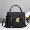 Elegant black textured canvas handbag with gold hardware and removable shoulder strap - Black
