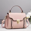 Elegant pink canvas textured crossbody handbag with gold hardware and stylish flap design - Pink