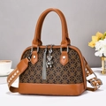 Elegant caramel faux leather and geometric fabric handbag with bear charm and crossbody strap - Earth Yellow Patterned