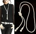 Detail of multi-layer pearl necklace featuring a woven knot and elegant dangling tassels - Gold Single Layer