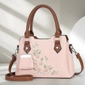 Rosa Handtasche mit Blumenstickerei, braunen Ledergriffen und großem Fassungsvermögen - Rosa