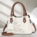 Detail of cream woven tote with floral embroidery and brown leather trim accents - Off-white