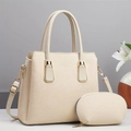 Detail of elegant cream handbag set with gold hardware and a matching small zipper pouch - Off-white