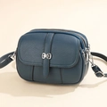 Dark blue pebbled leather crossbody bag with three zipper compartments and silver buckle - Blue