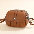 Caramel brown soft leather crossbody bag with multi-layer zippers and bow detail - Khaki/Earth Yellow