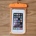 Waterproof orange PVC phone pouch with secure swivel locks and black neck lanyard - Noctilucent Orange
