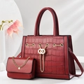Detail of wine red crocodile embossed leather handbag set with luxury gold chain hardware - Tote Bag And Chain Bag / Burgundy