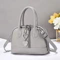 Grey lychee texture leather handbag with heart pendants and adjustable strap - Gray